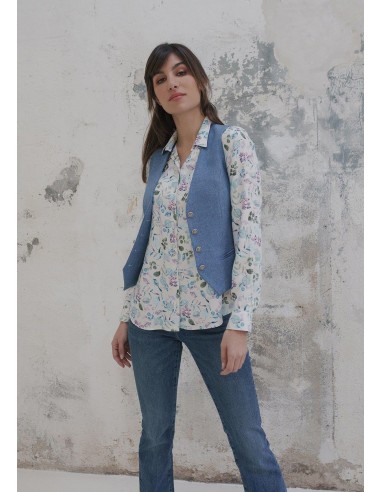 Chaleco Moscú de tweed azul, entallado y con escote pico.