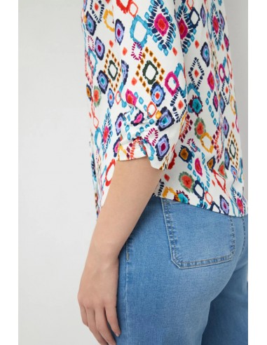 Camisa Pastora de Tinta & Bariloche - Plano corto de la parte posterior y la manga remangada.