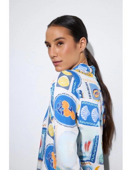 Vestido Yasmin Estampado Azul – Tinta y Bariloche - vista posterior/lateral con detalle de hombro y espalda del vestido